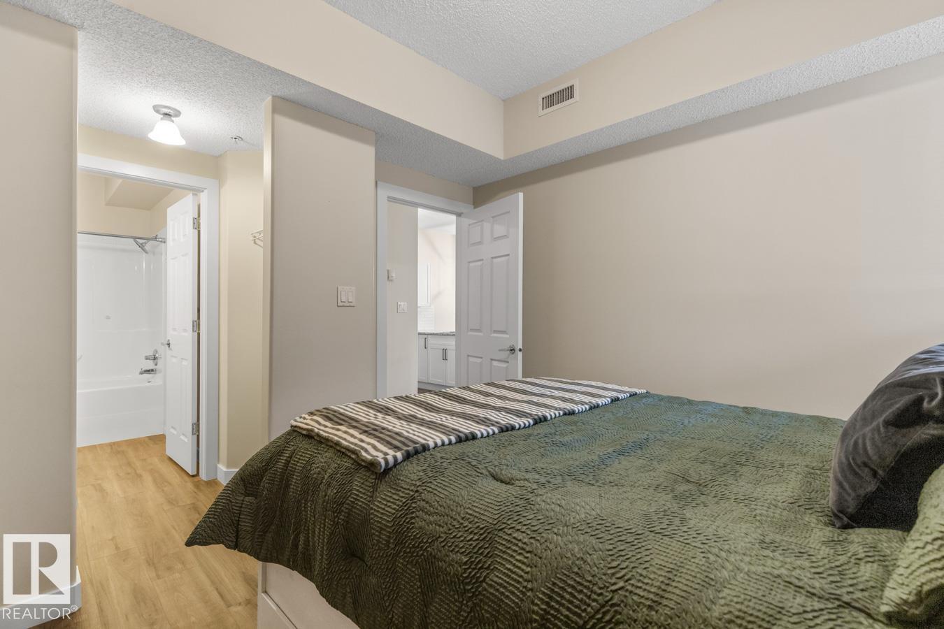 #101 8488 111 ST NW - 18