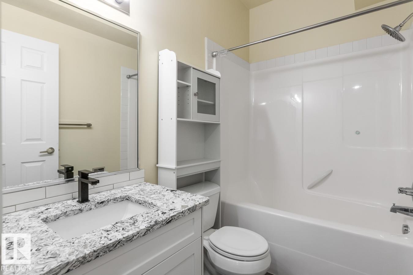 #101 8488 111 ST NW - 19