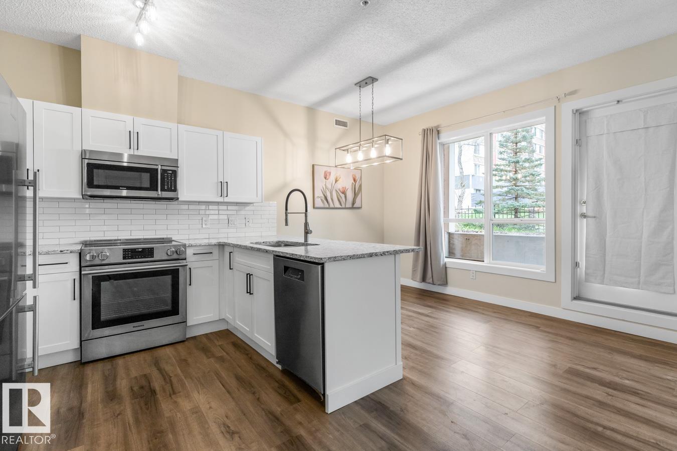 #101 8488 111 ST NW - 7