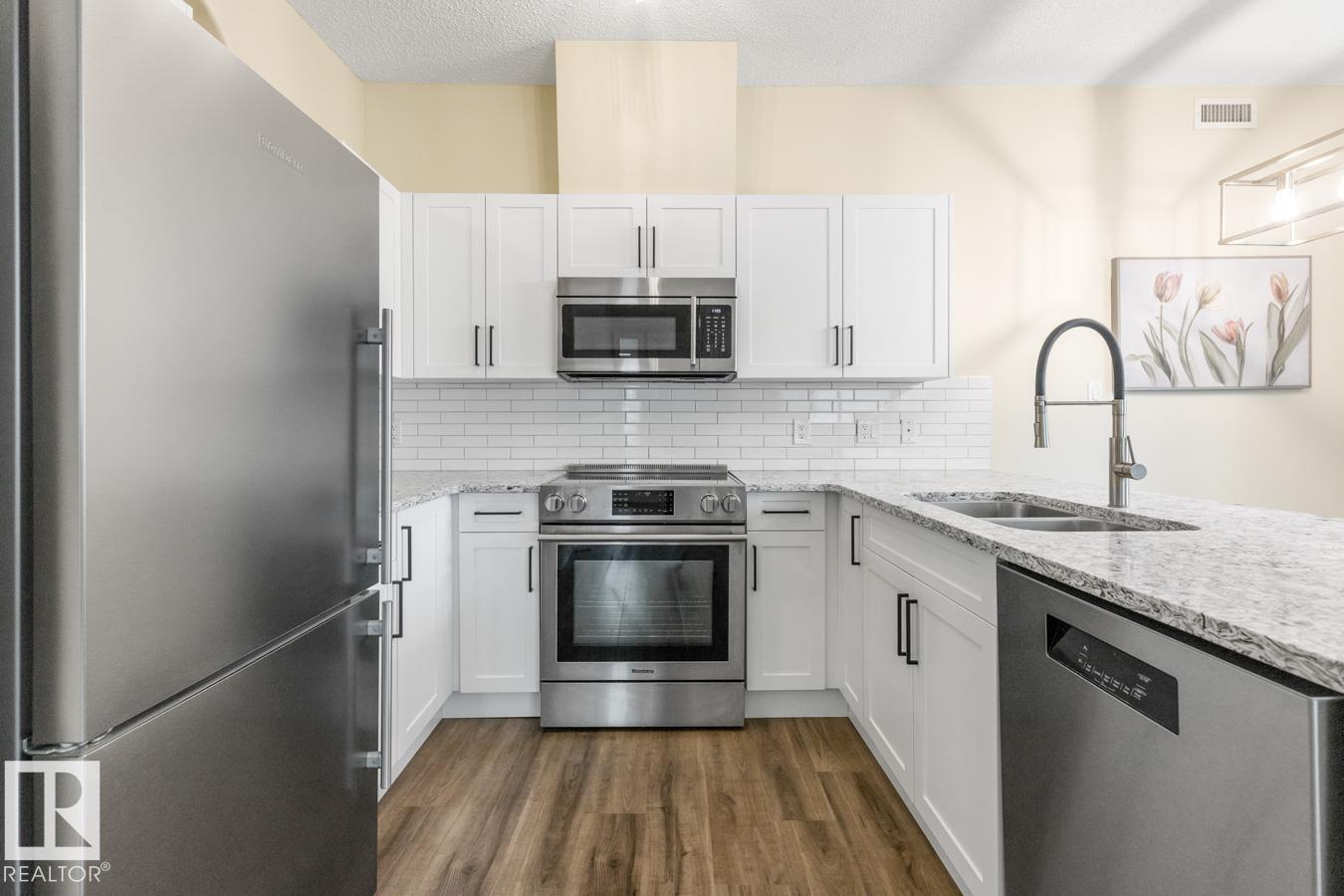 #101 8488 111 ST NW - 9