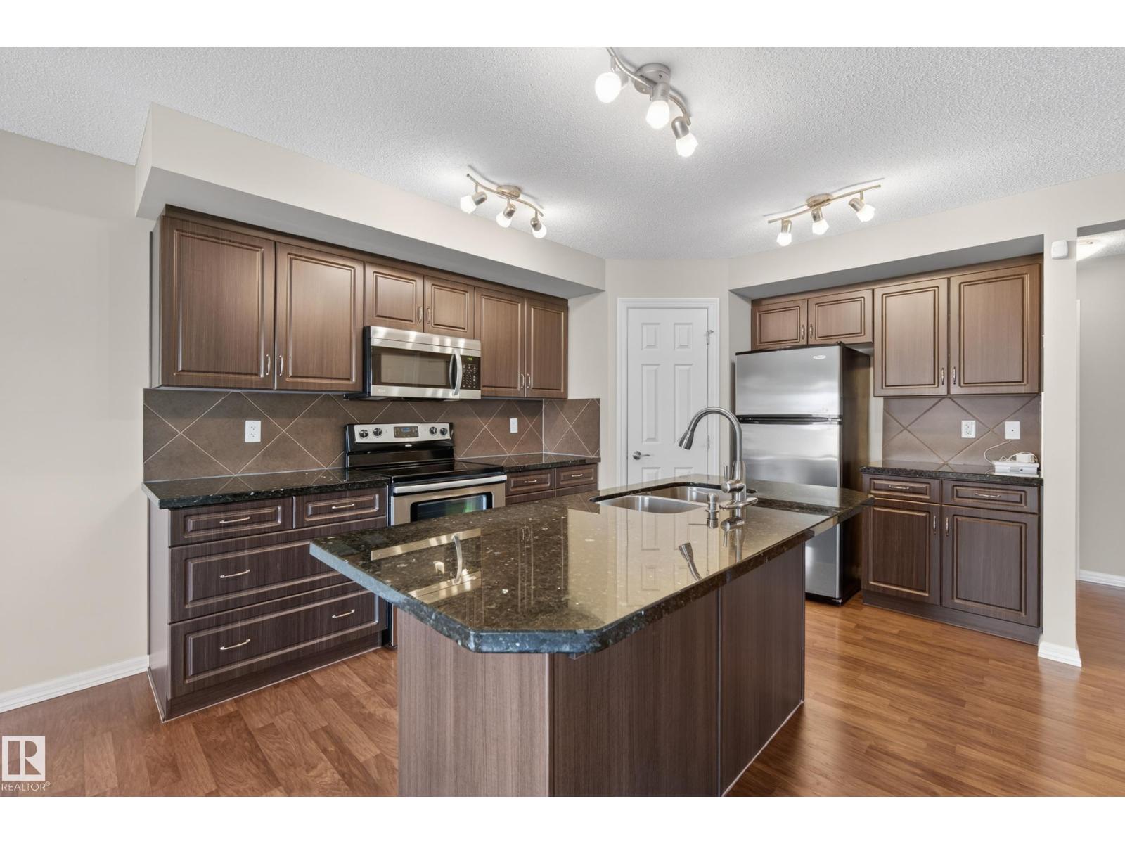115 RUE MONIQUE - 12
