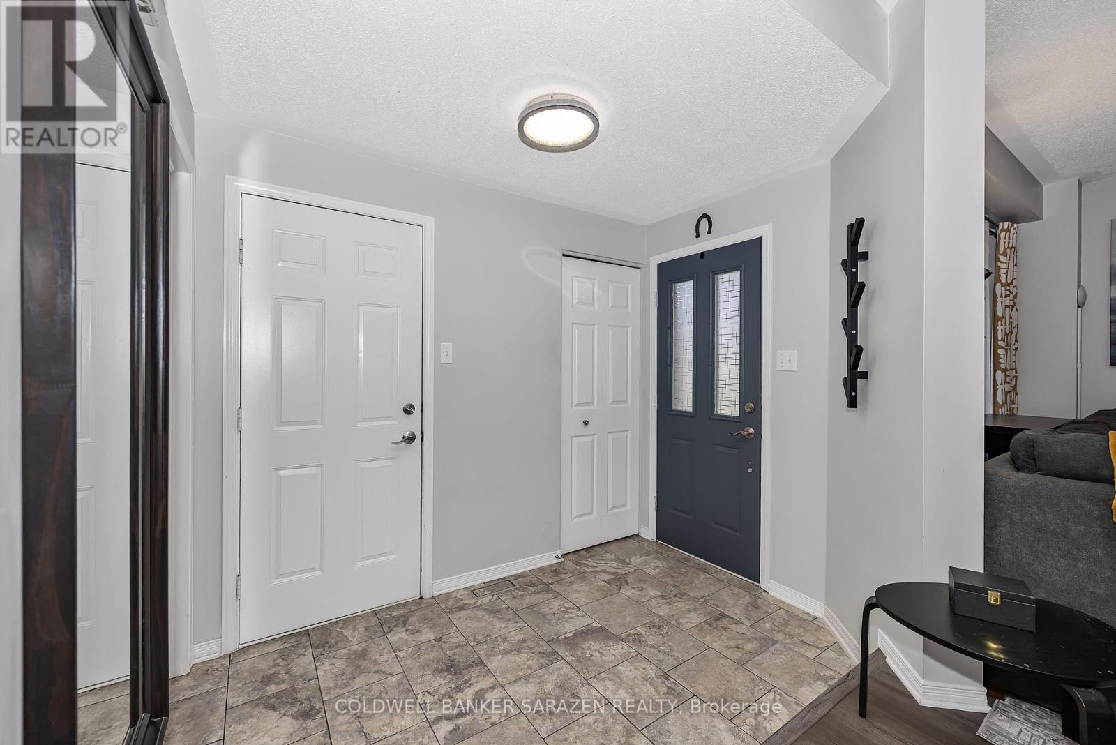 Foyer - Left door to garage, middle closet