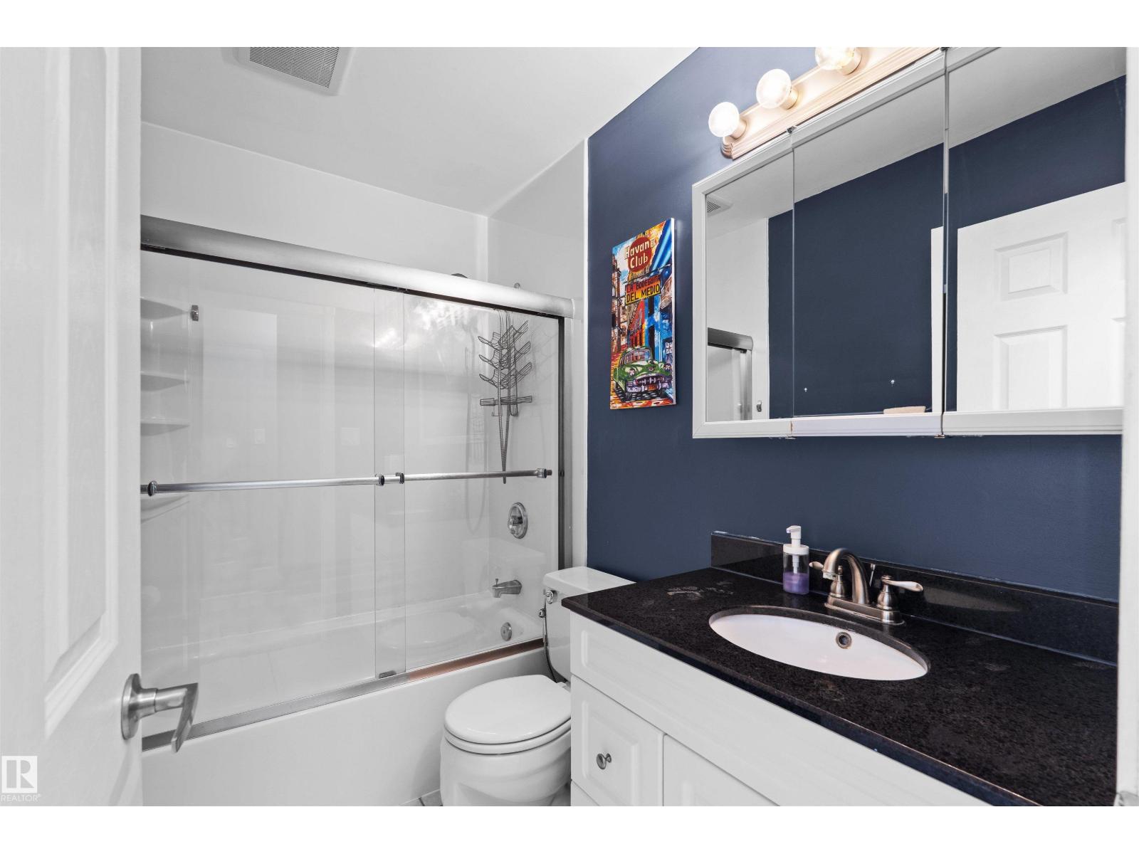 12128 25 AV NW - 13