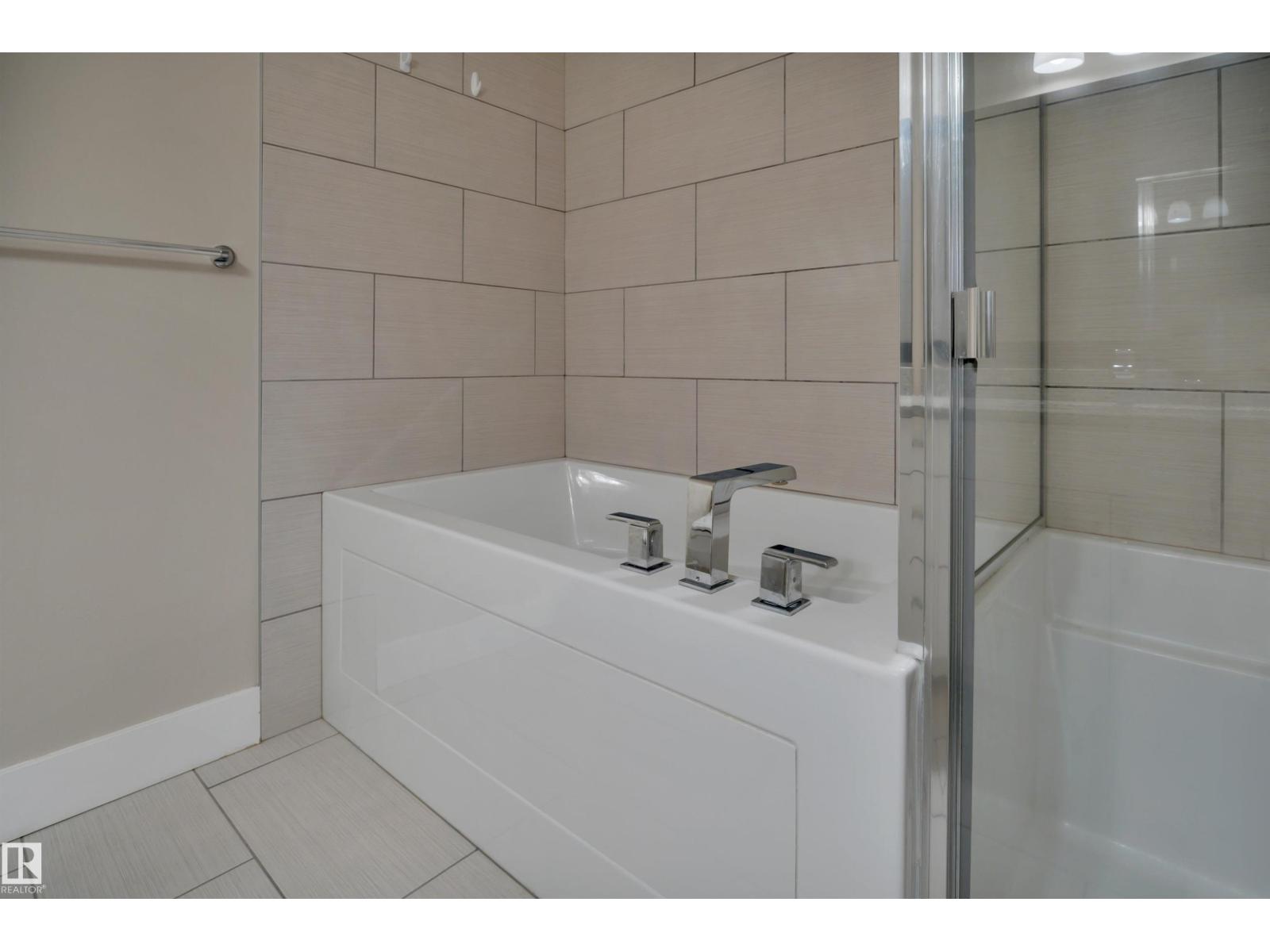 #243 6079 MAYNARD WY NW - 33