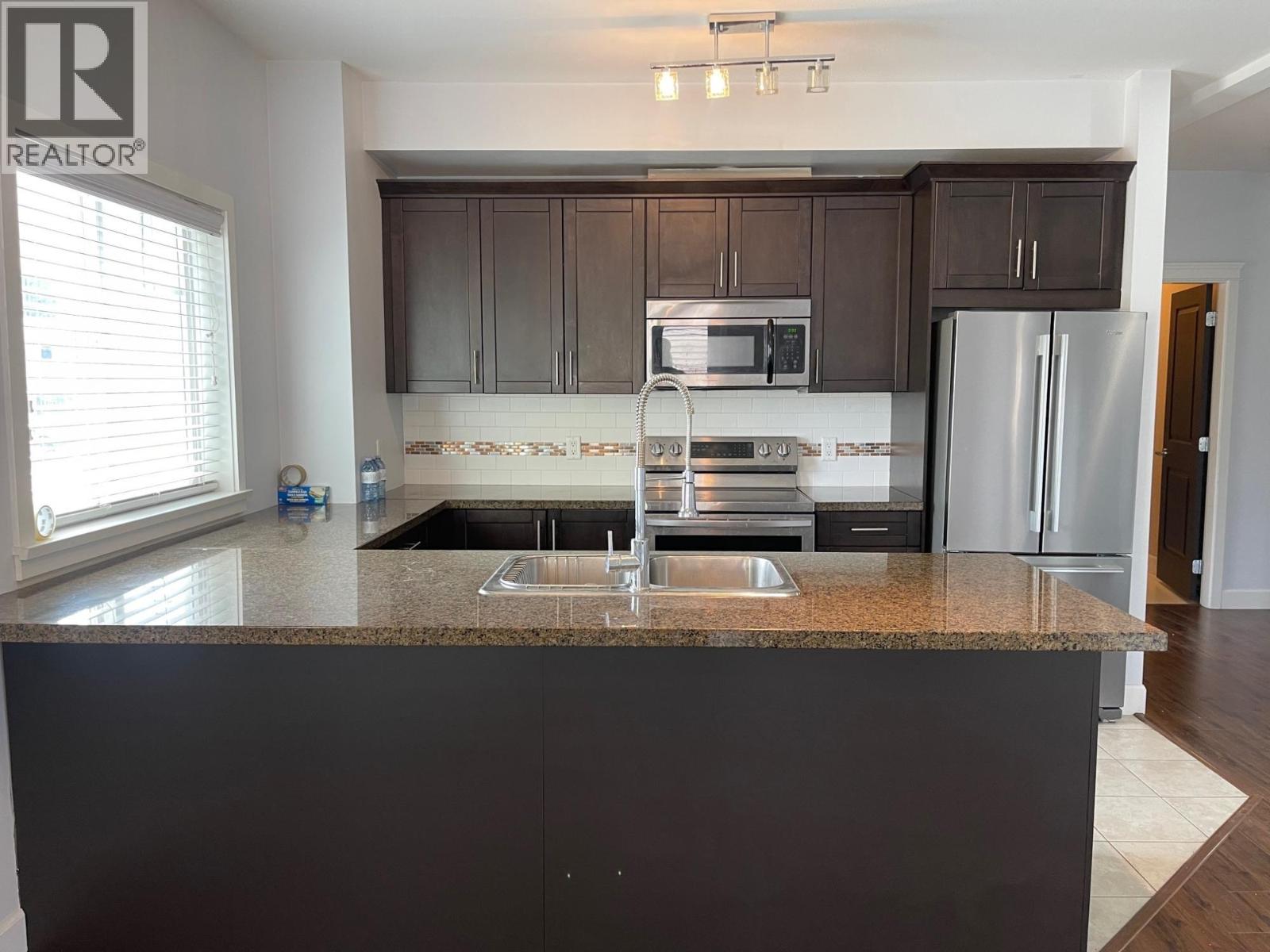 #203 2799 CLAPPERTON Avenue - Image 3