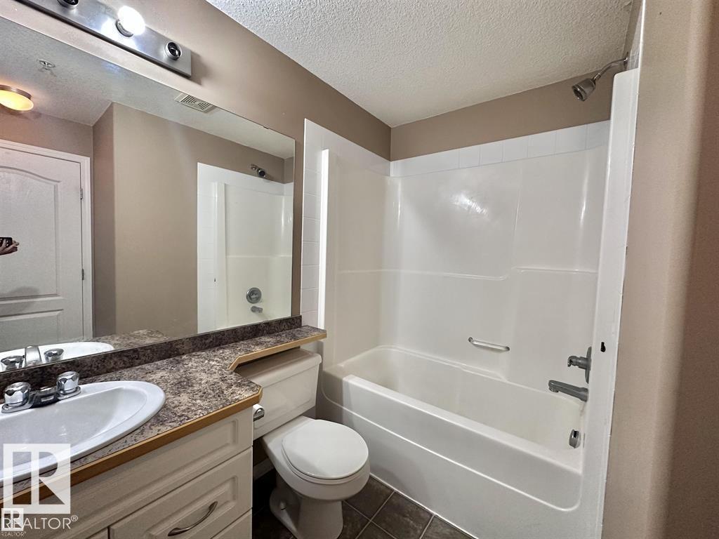 #115 3425 19 ST NW - 12