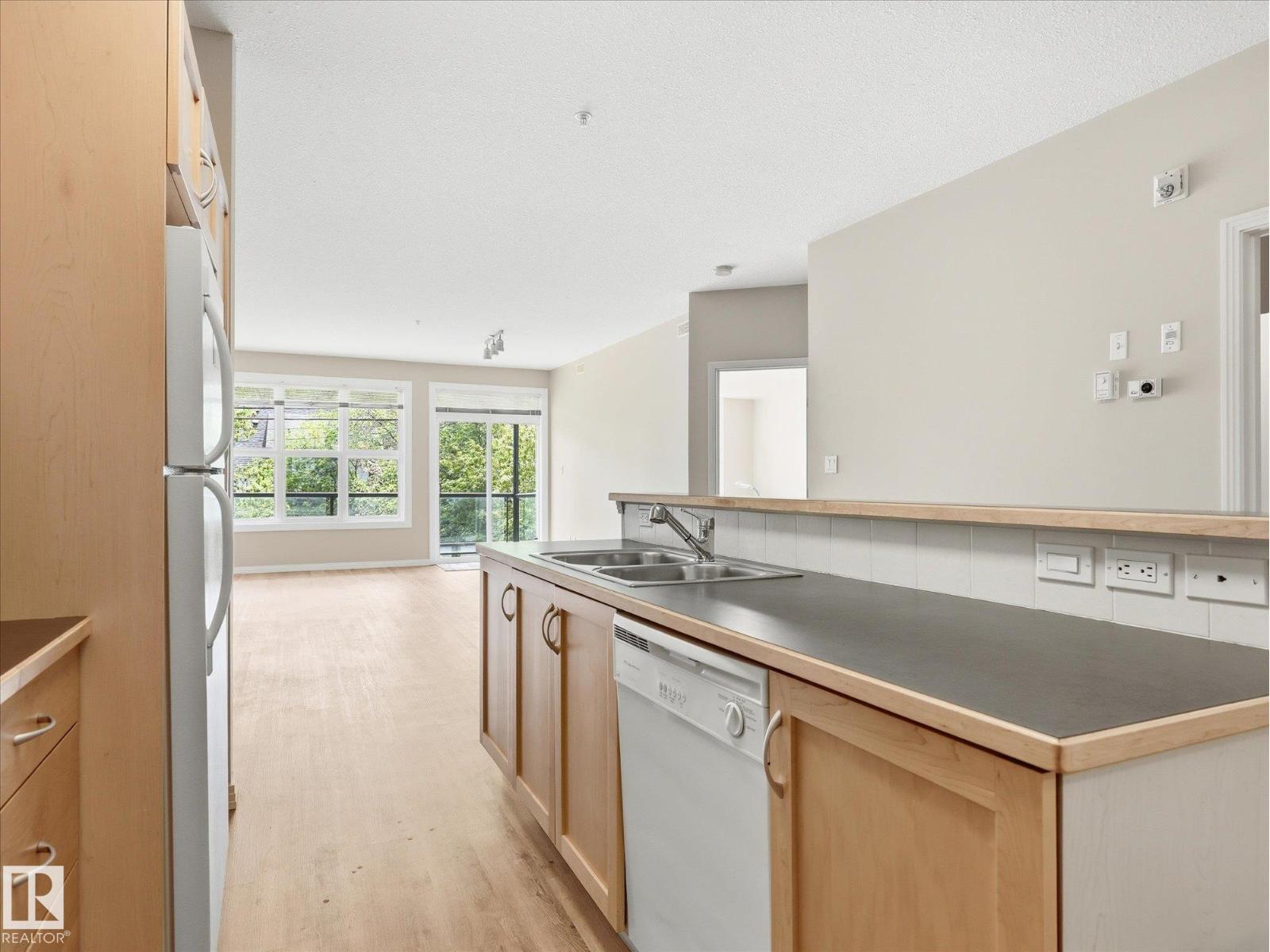 #207 8619 111 ST NW - 8