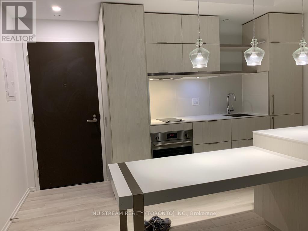 Living Room Overlook Entrance And Kitchen