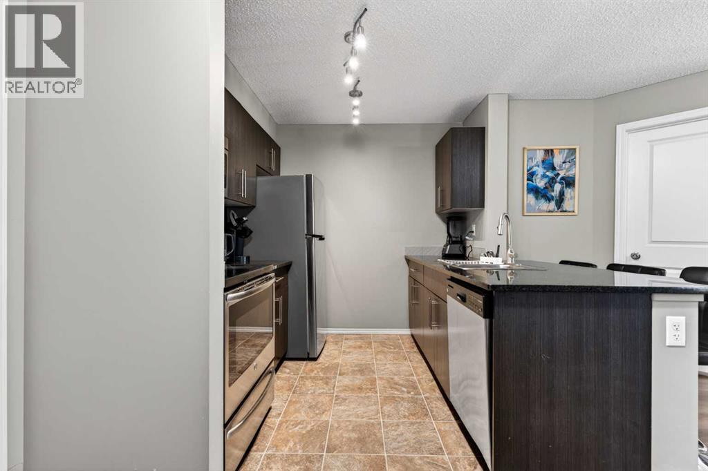 #9103 403 Mackenzie Way SW - Image 2