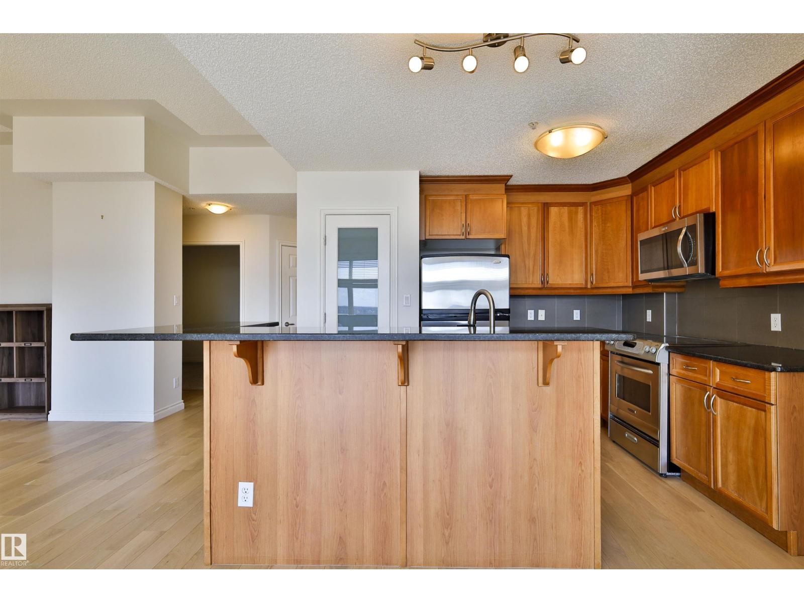 #906 9020 JASPER AV NW — photo 10
