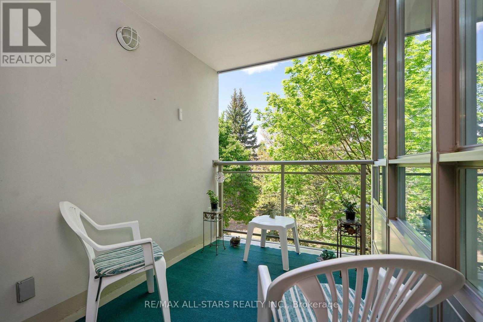 Covered balcony w green views
