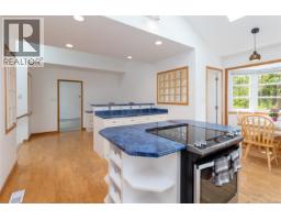 Living room - 2 6755 Wallace Dr, Central Saanich, BC V8M1A2 Photo 18