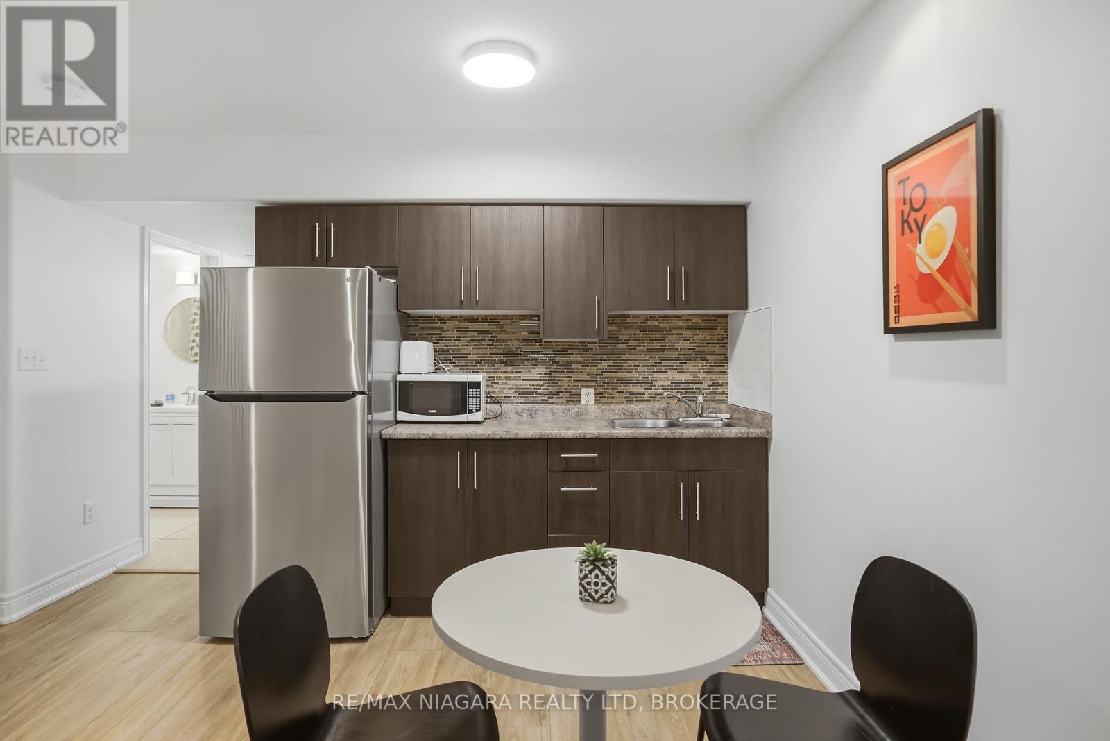#104 6045 DUNN STREET - 19