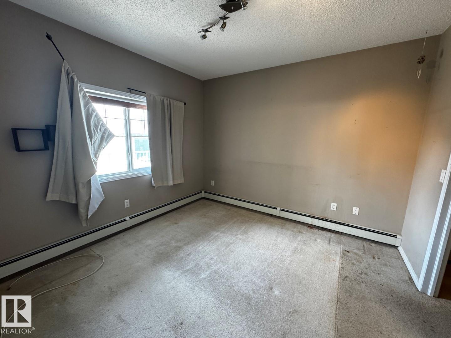 #300 16715 100 AV NW - 5