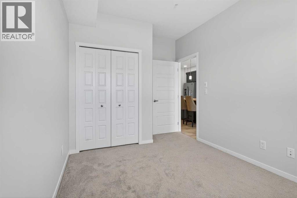 #305 200 Harvest Hills Place NE - 23