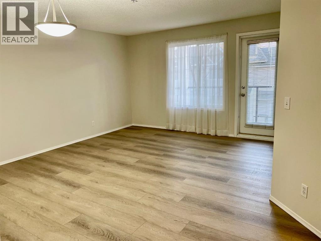#1207 928 Arbour Lake Road NW - Image 2