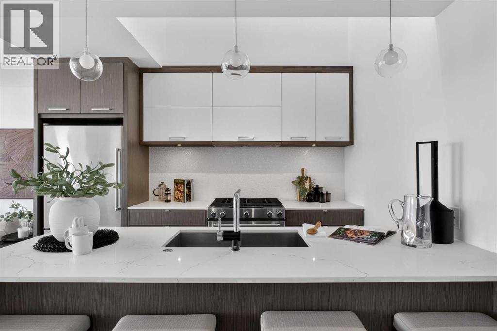#402 3450 19 Street SW - 5