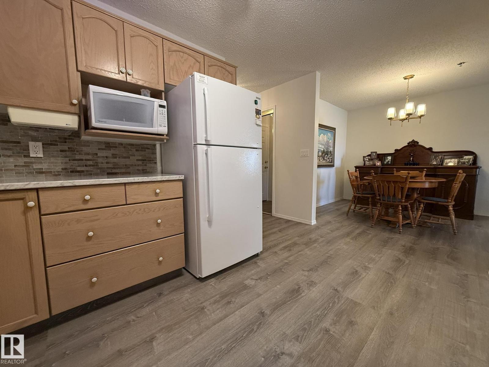 #102 10903 21 AV NW - 9