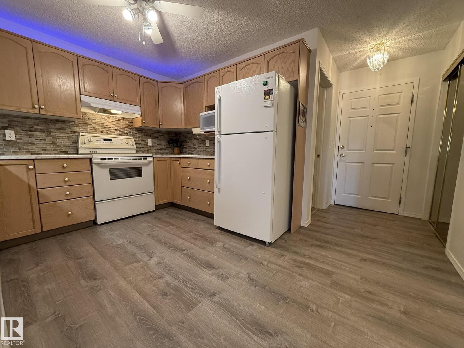 #102 10903 21 AV NW - 5