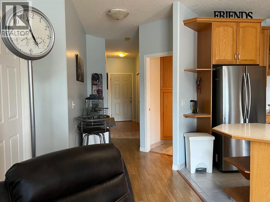 Living room, looking towards the attached rear garage door