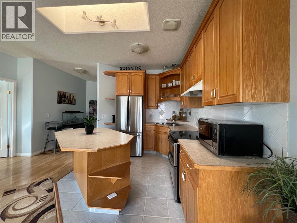 Open concept kitchen, with 3 appliances