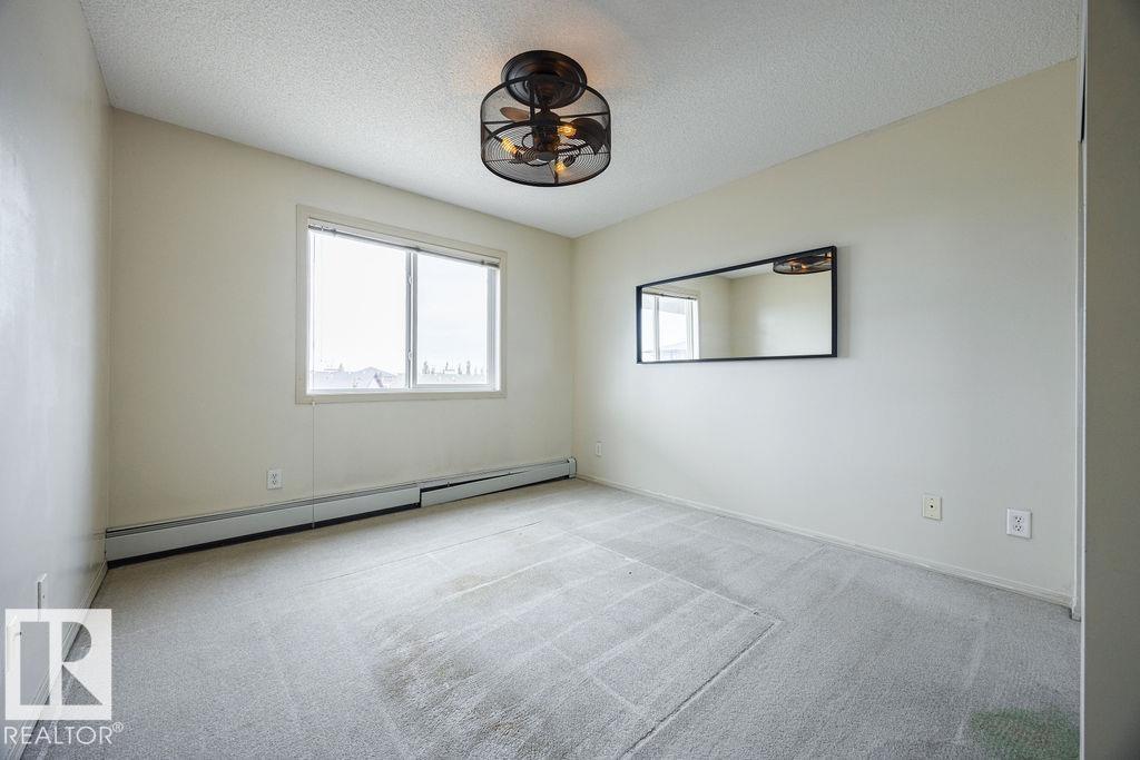 #404 5951 165 AV NW - 10
