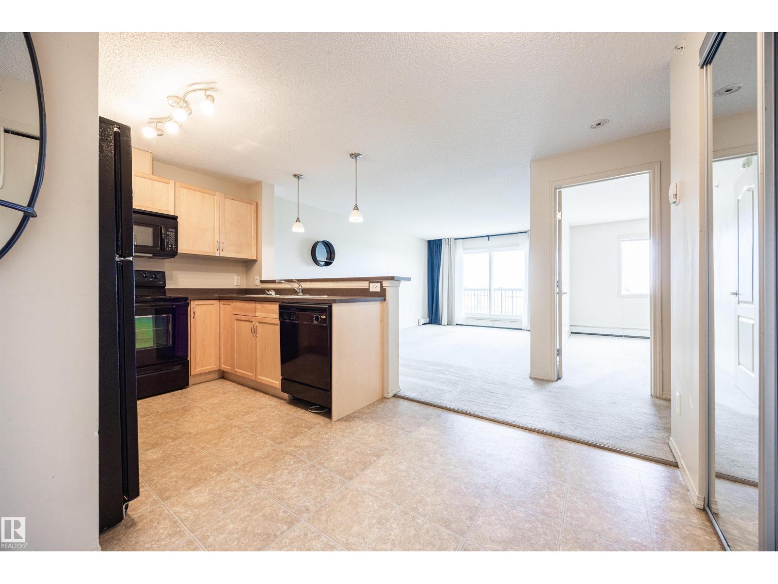 #404 5951 165 AV NW - Image 2