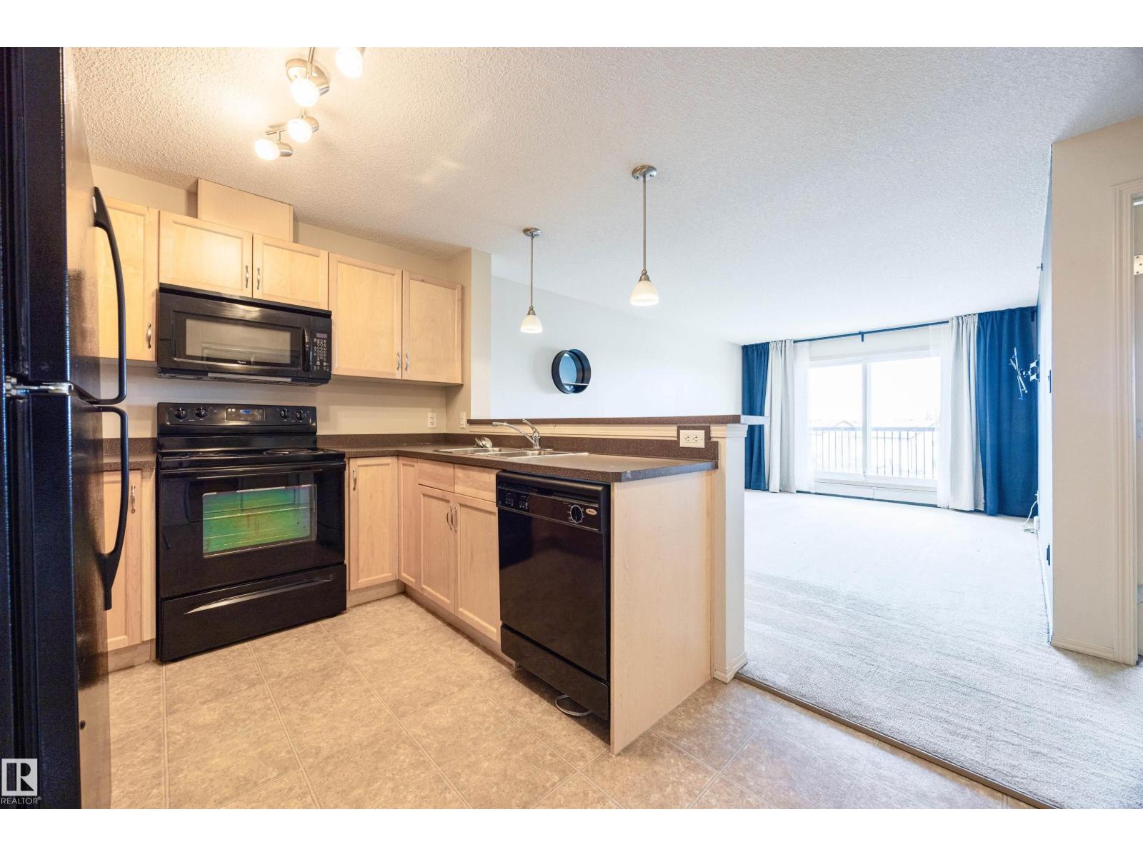 #404 5951 165 AV NW - Image 3