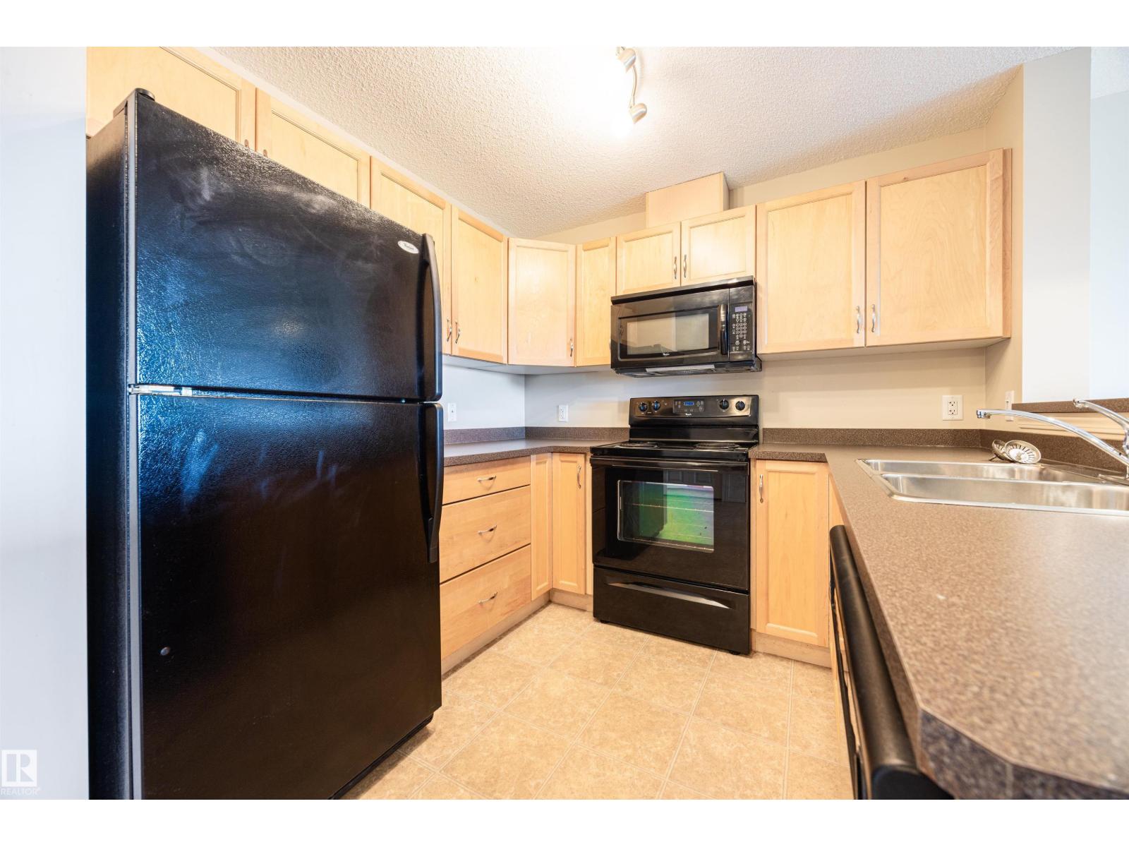 #404 5951 165 AV NW - 4
