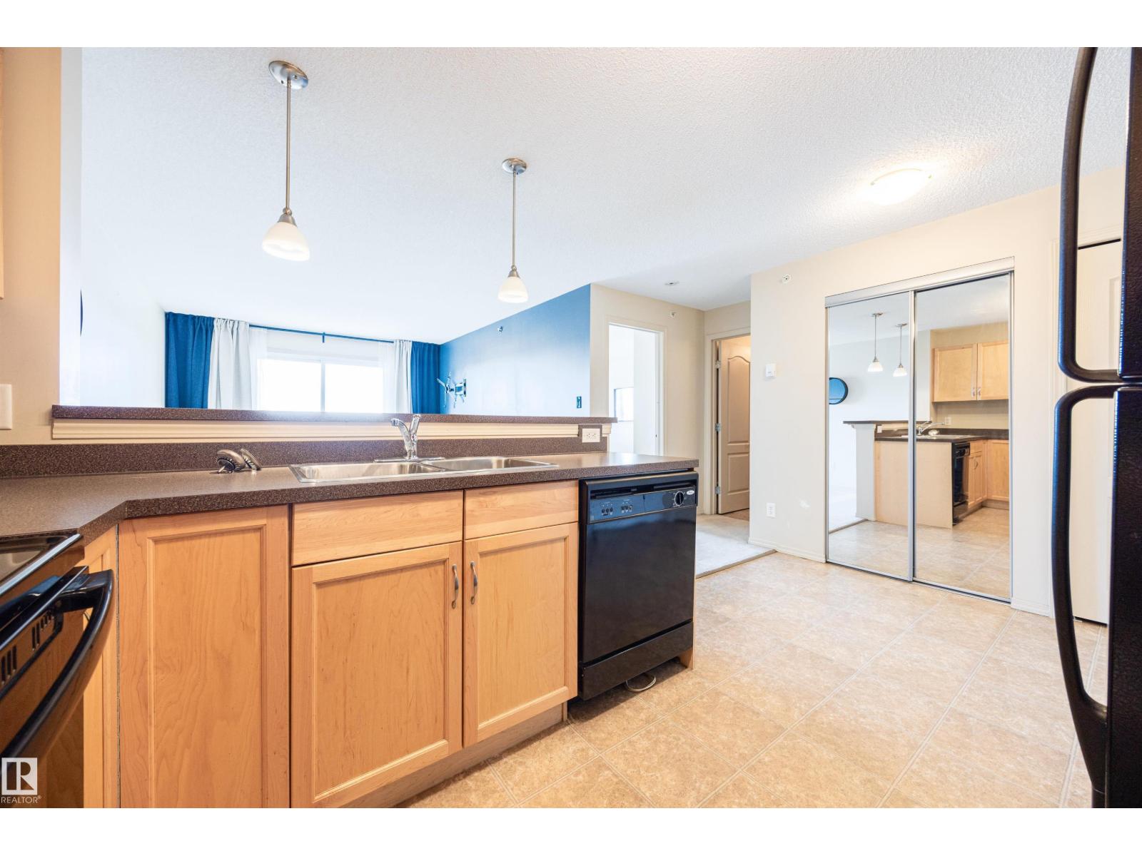 #404 5951 165 AV NW - 5