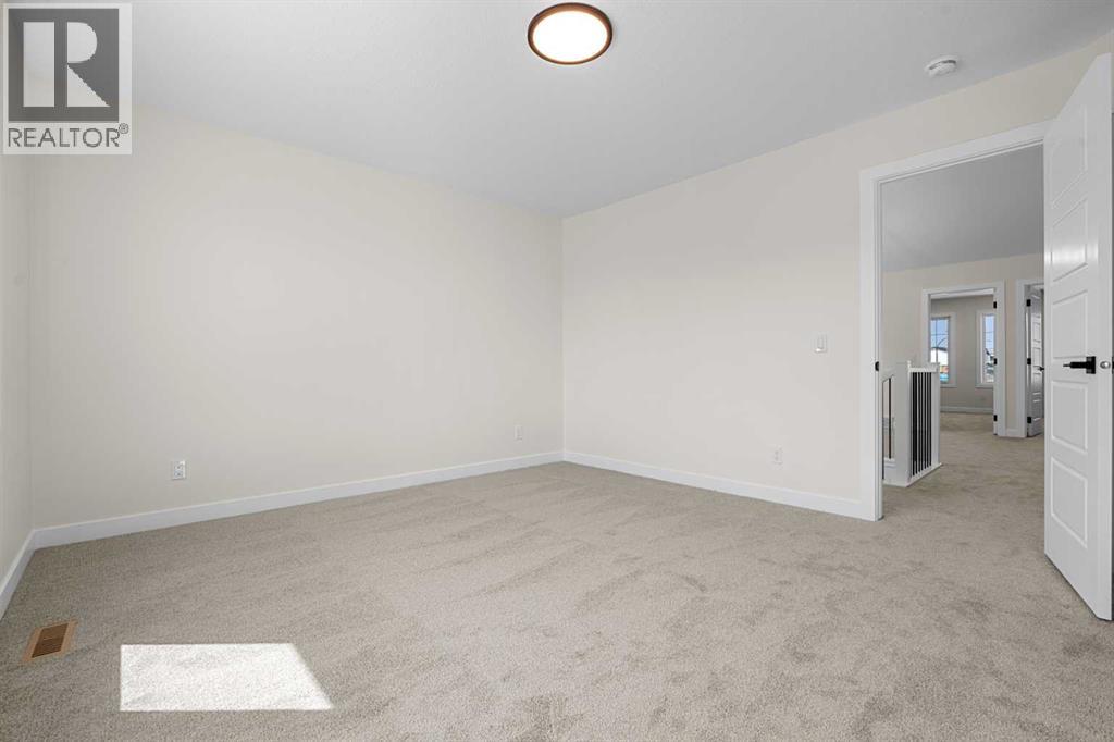568 Buffaloberry Manor SE - 23