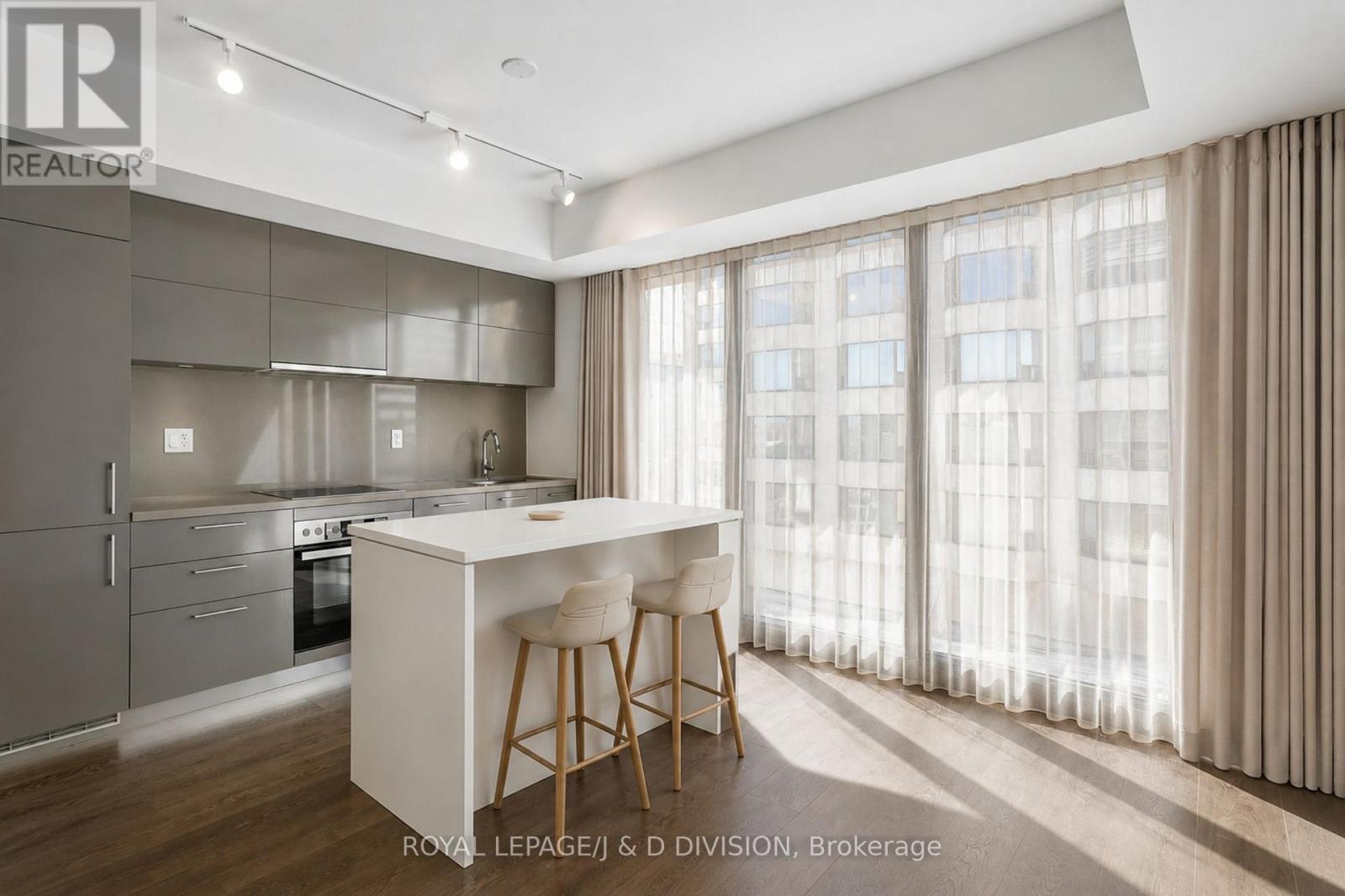virtually staged with center island and curtains