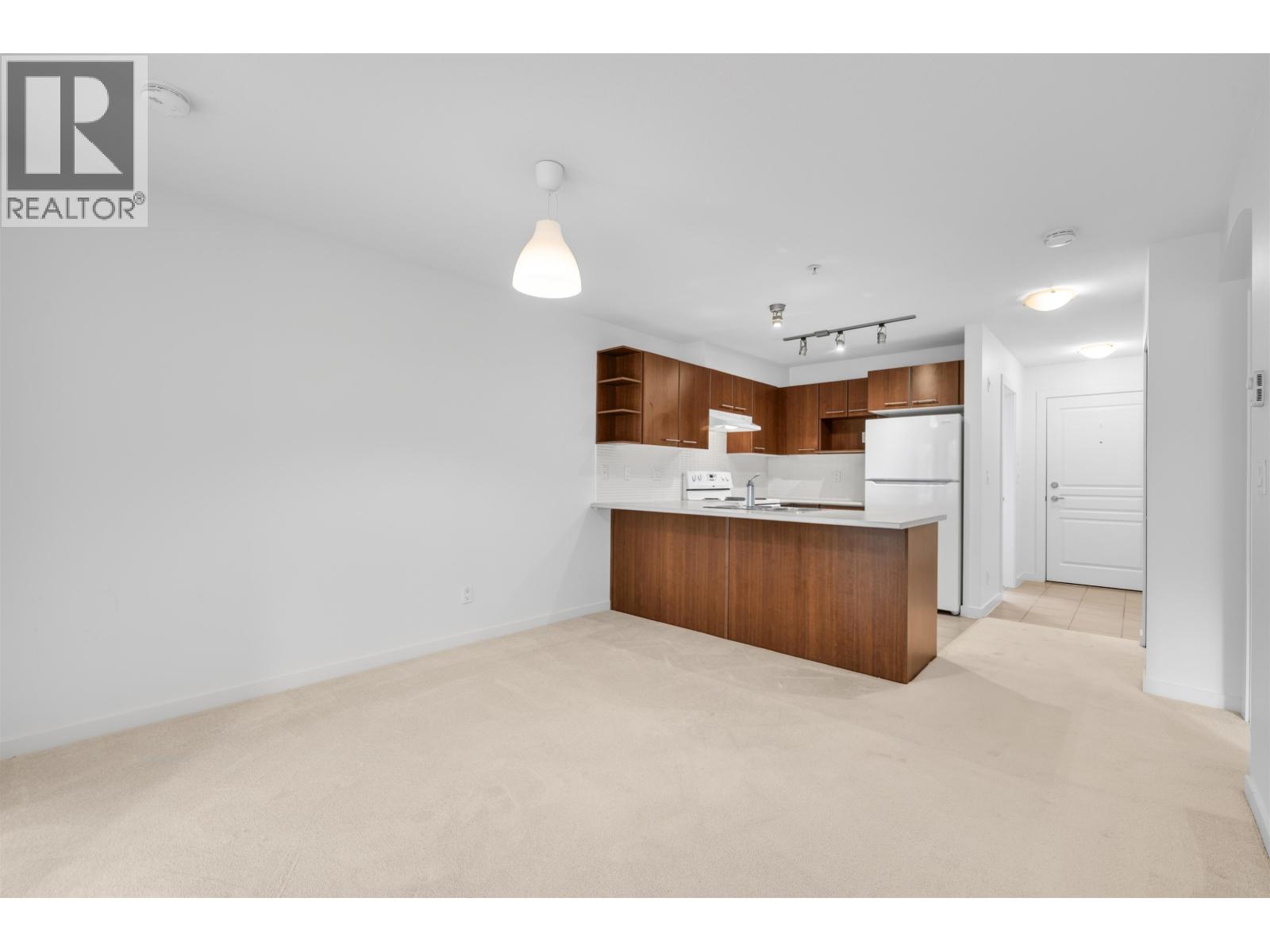 310 4868 BRENTWOOD DRIVE — main photo