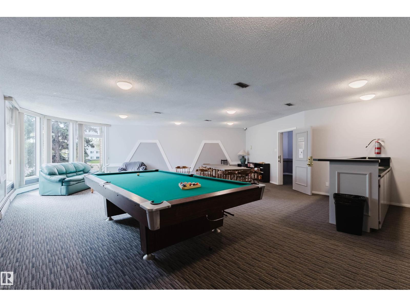 #126 5125 RIVERBEND RD NW - 34