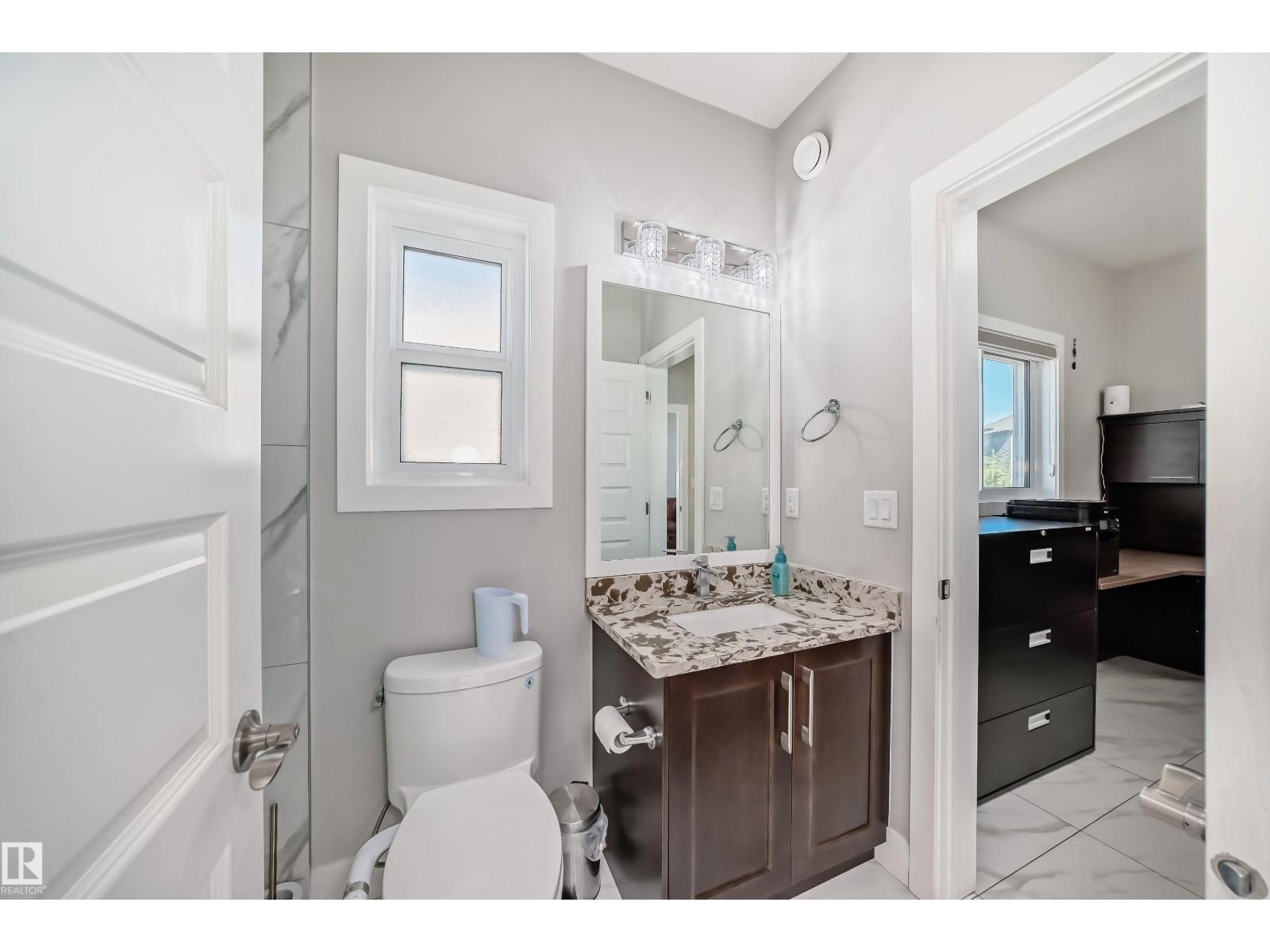 2464 15 AV NW NW - 9