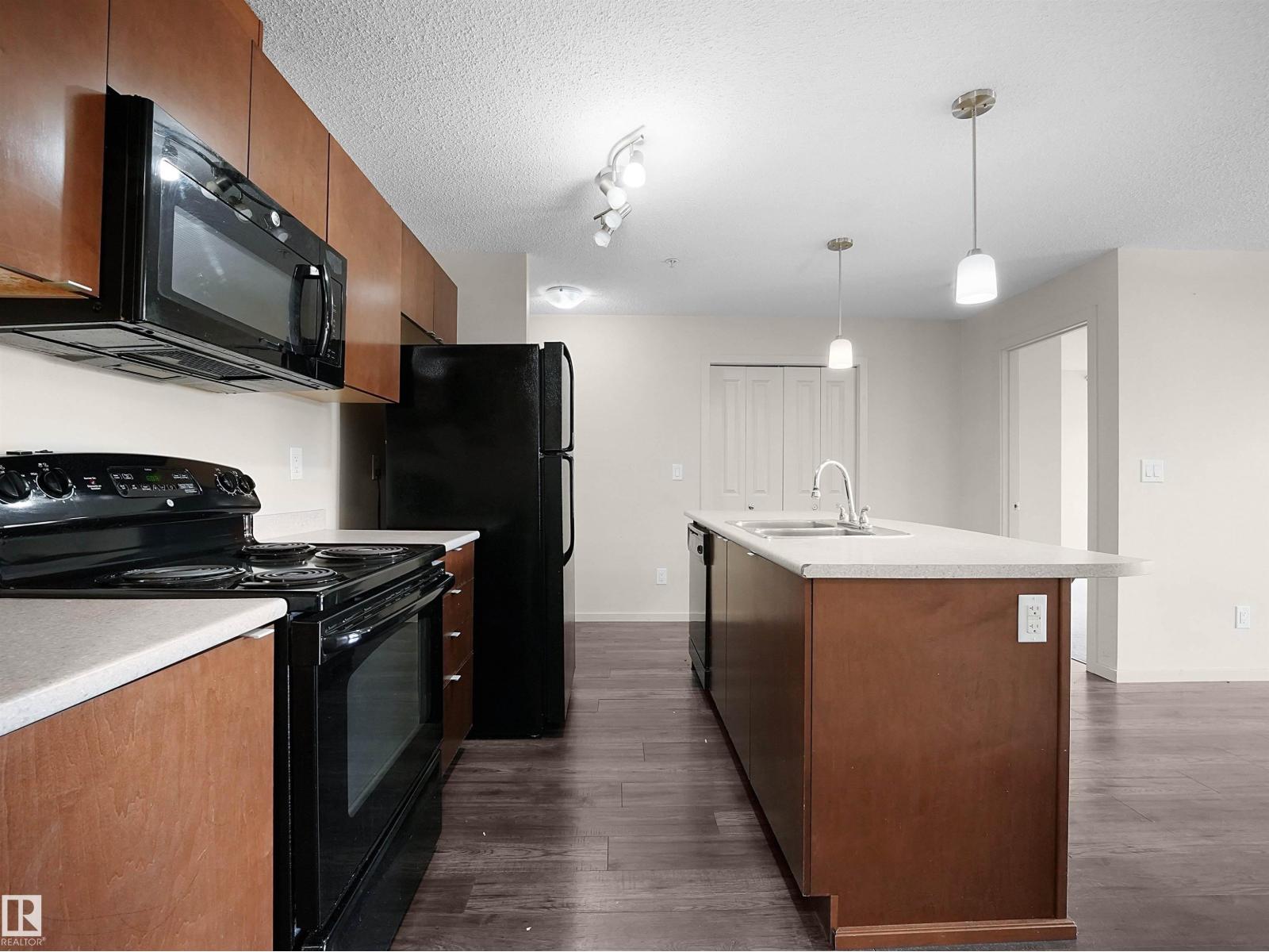 #215 3357 16A AV NW - 9
