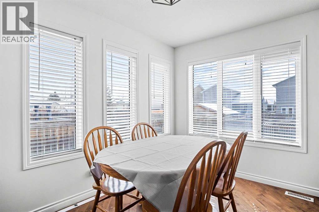 The dining area has lots of windows to enjoy that big backyard