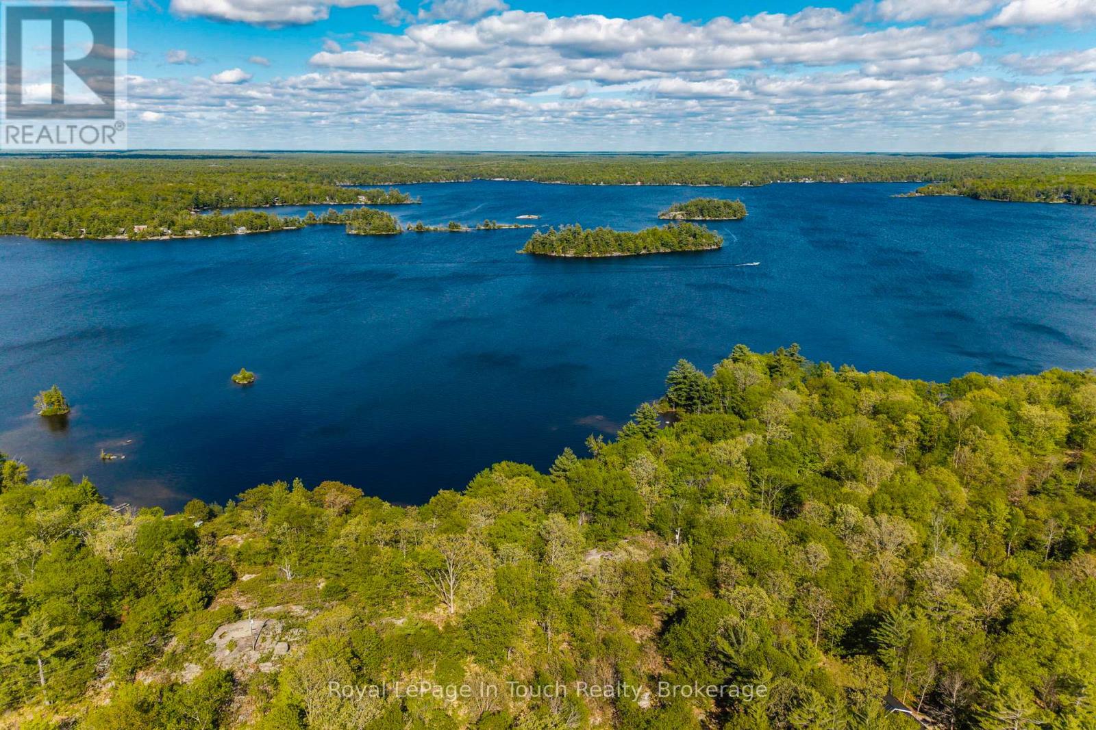 1958 SIX MILE LAKE SHORE ISLAND