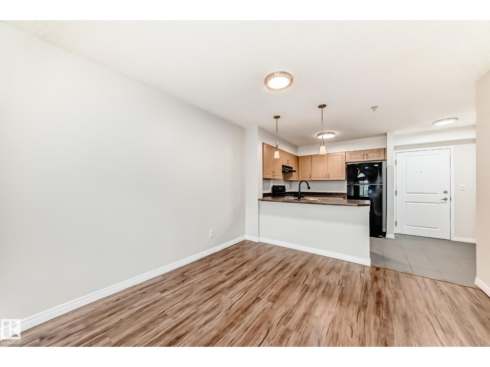 #104 11449 ELLERSLIE RD SW - 13