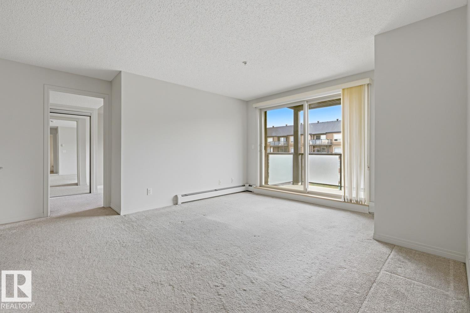 #312 13908 136 ST NW NW - 19
