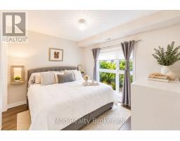 129 - 128 Grovewood Common, Oakville, ON L6H0X3 Photo 7