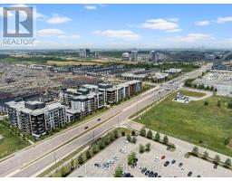 129 - 128 Grovewood Common, Oakville, ON L6H0X3 Photo 6