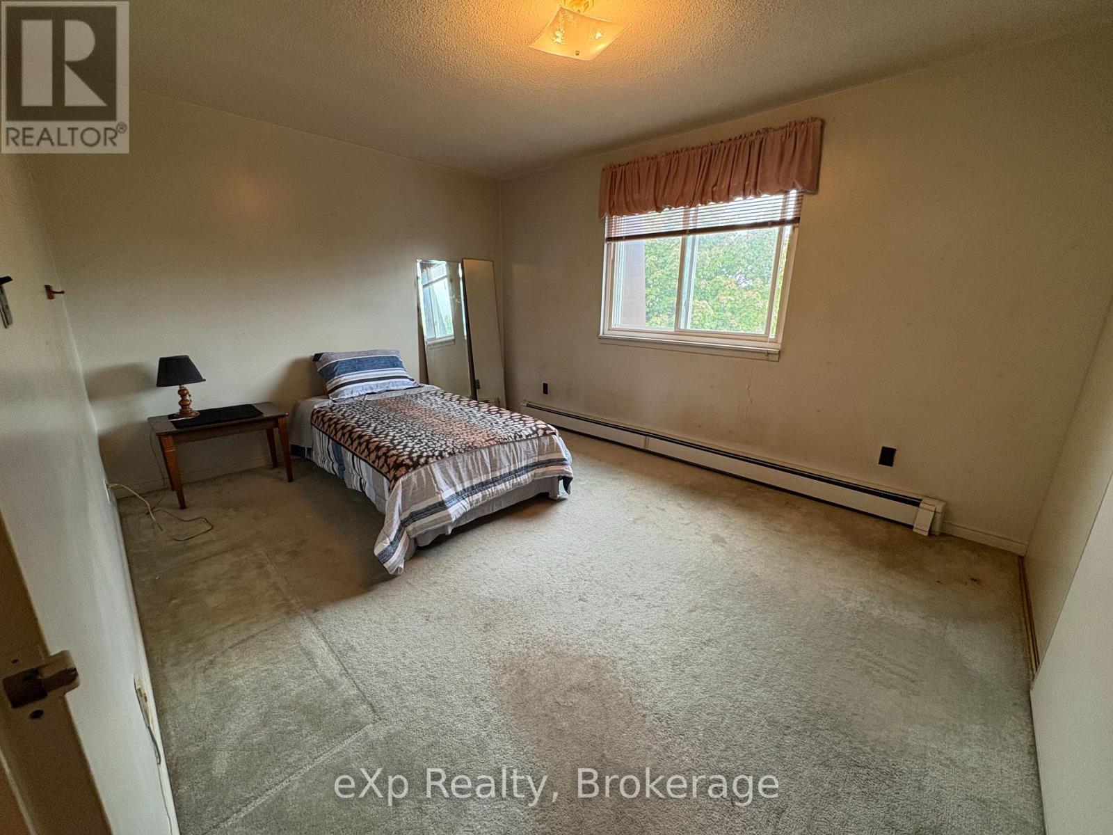 #303 925 10TH AVENUE E - 10