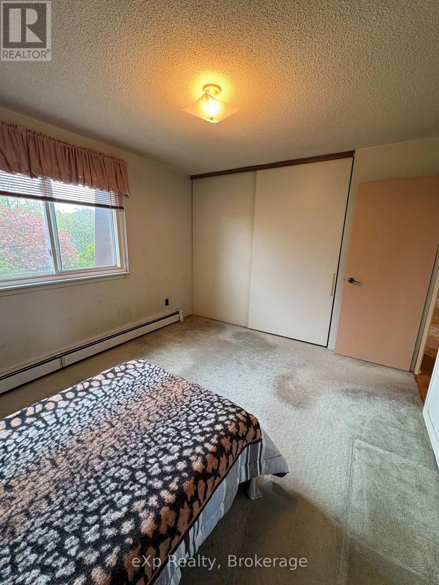 #303 925 10TH AVENUE E - 11