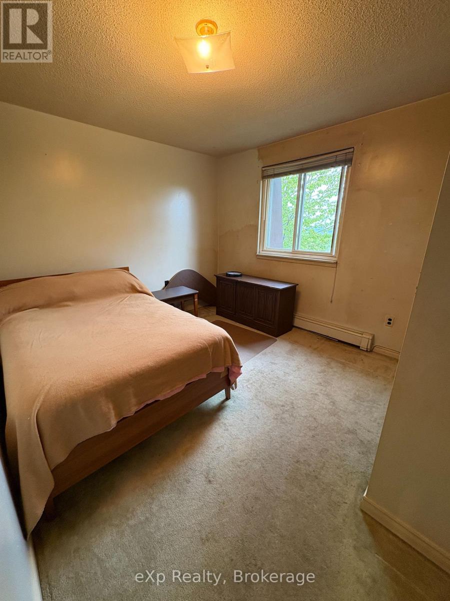 #303 925 10TH AVENUE E - 8