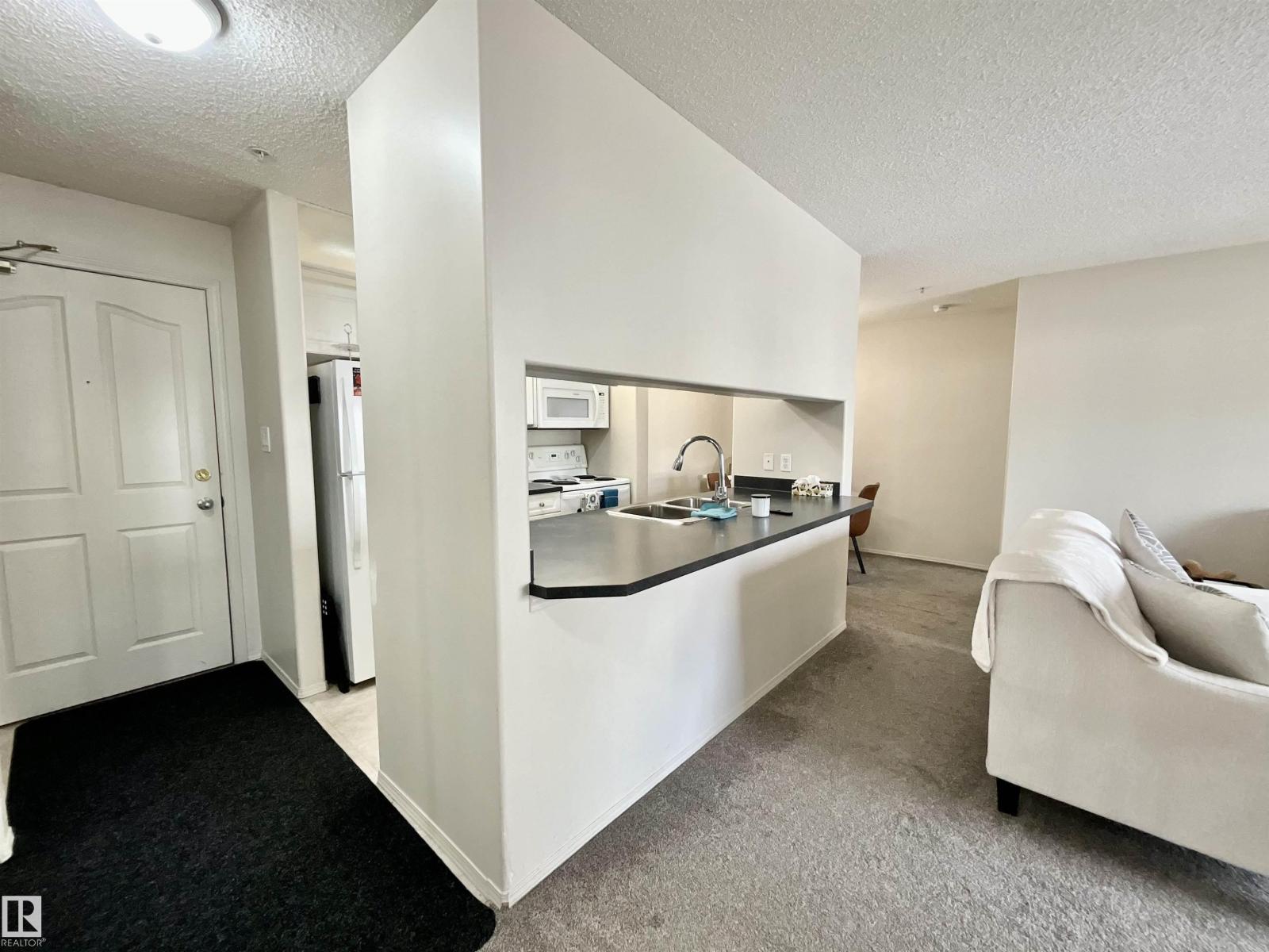 #217 16303 95 ST NW - 17