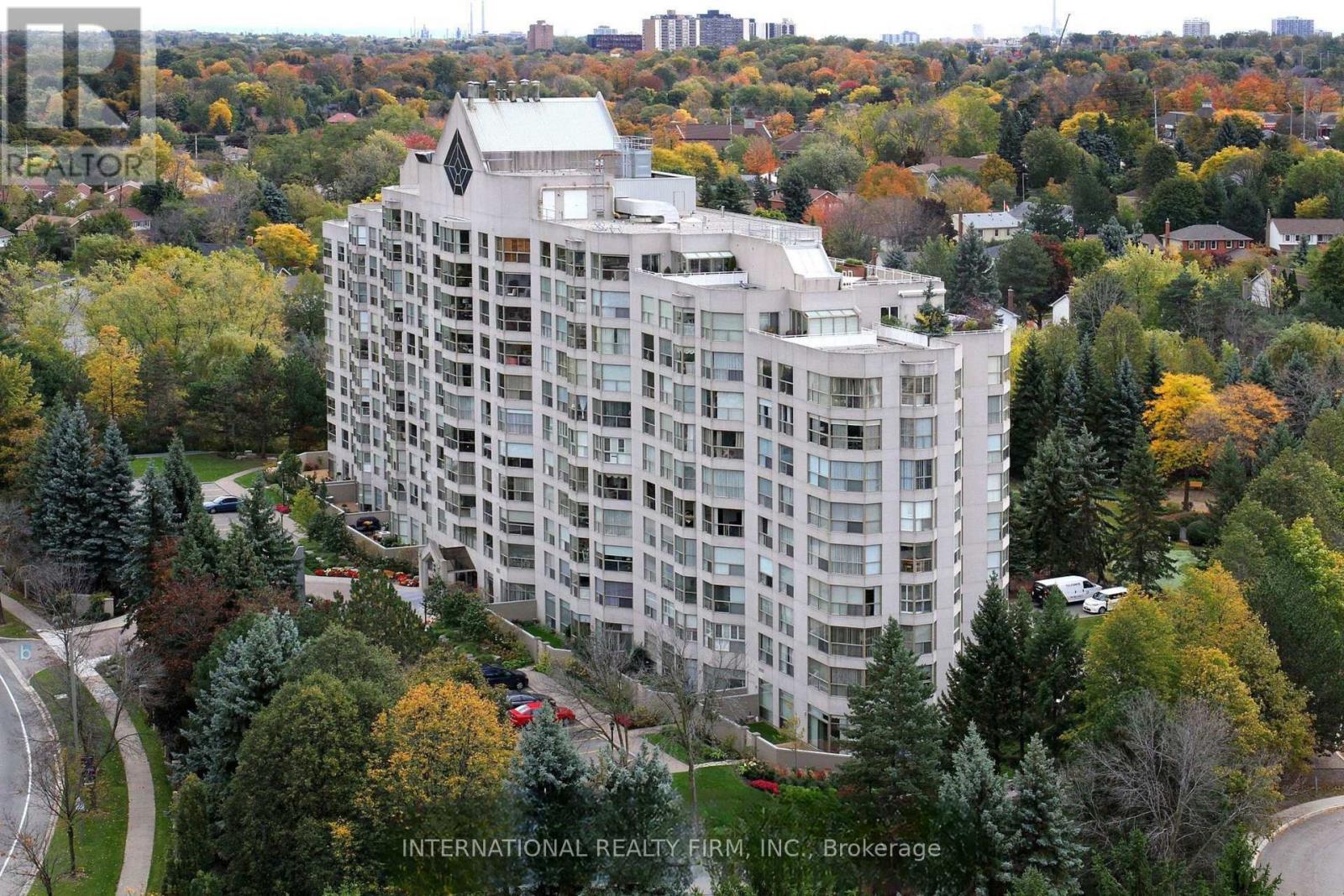 BUILDING SURROUNDED BY GREENBELT & WALKING TRAILS