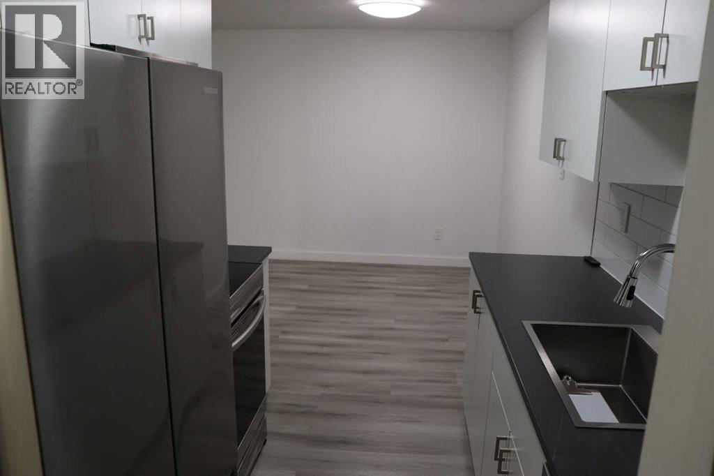 #201A 5611 10 Avenue - 19