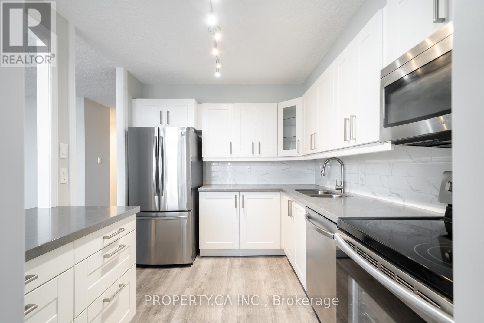 #1204 355 RATHBURN ROAD E - 13