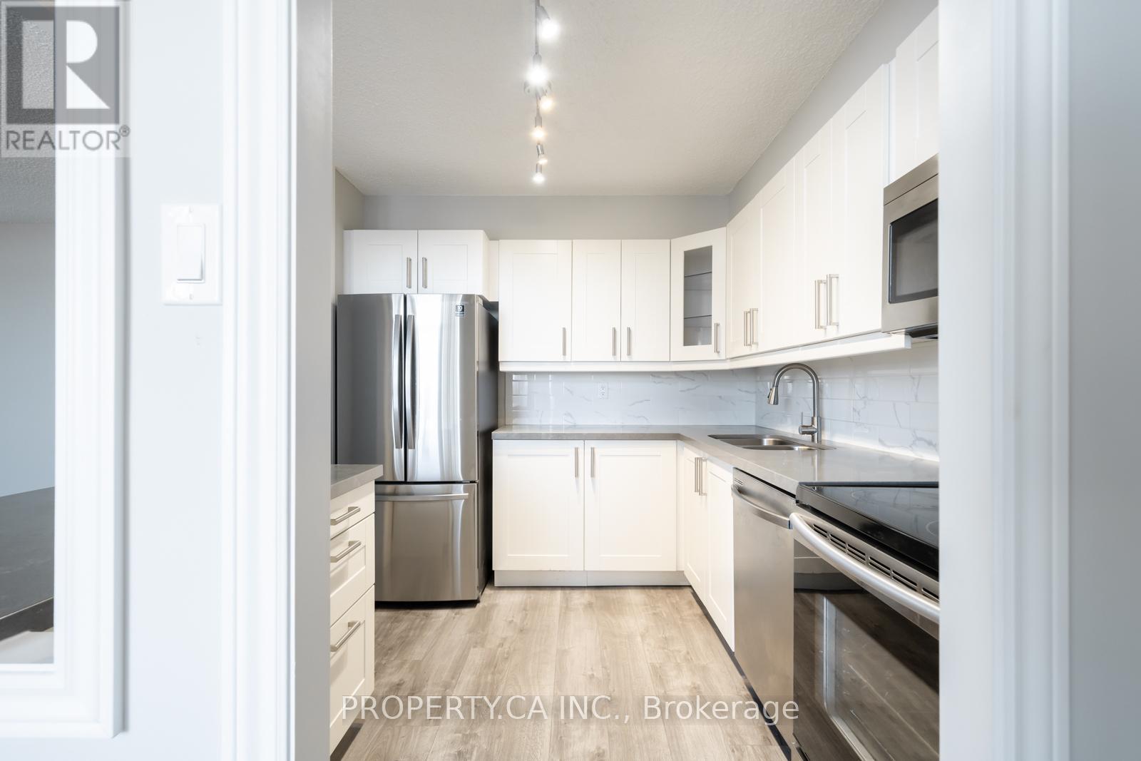 #1204 355 RATHBURN ROAD E - 14